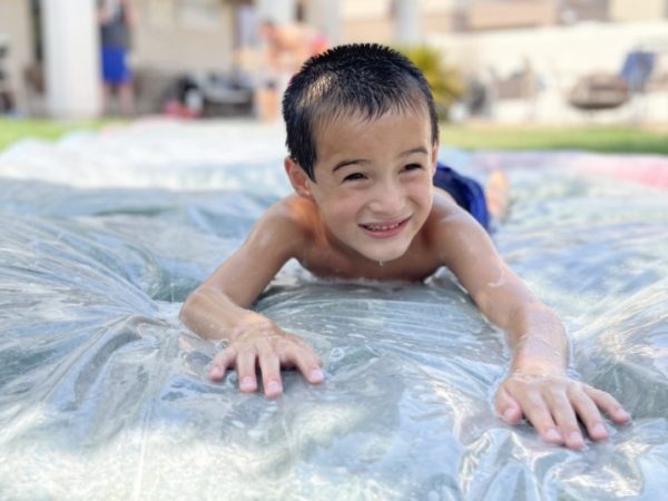 End Summer With a BANG & Make This Huge 50-foot DIY Slip and Slide for Less Than $40!