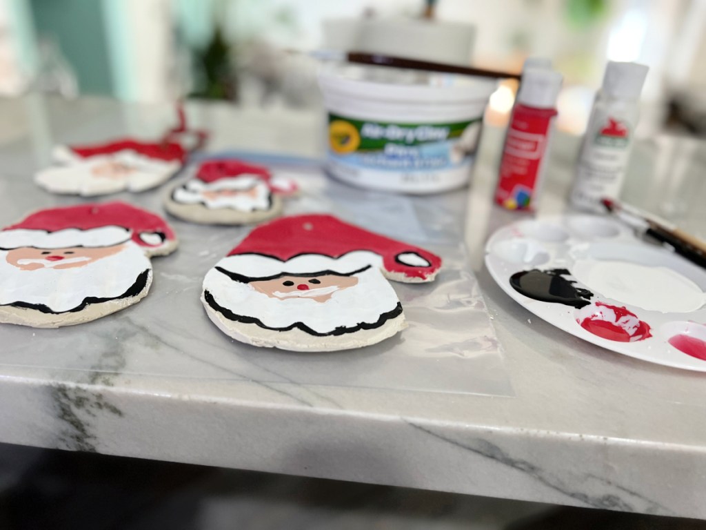 santa ornaments drying on counter