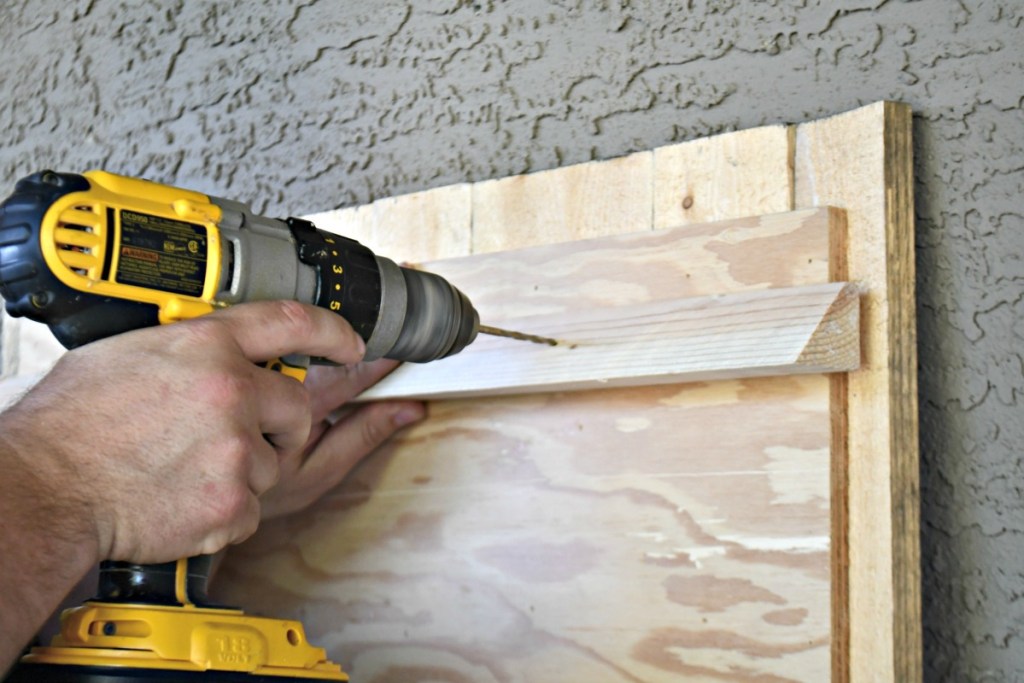 making a DIY french cleat for hanging heavy items on the wall 