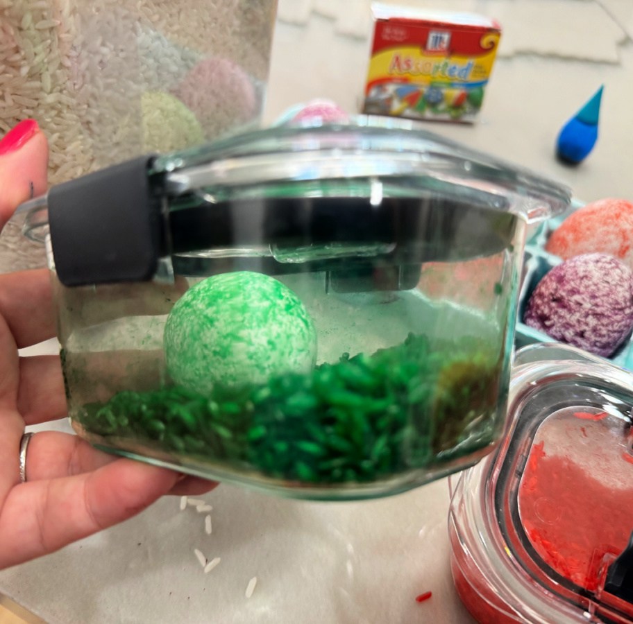 shaking up an egg with dyed rice