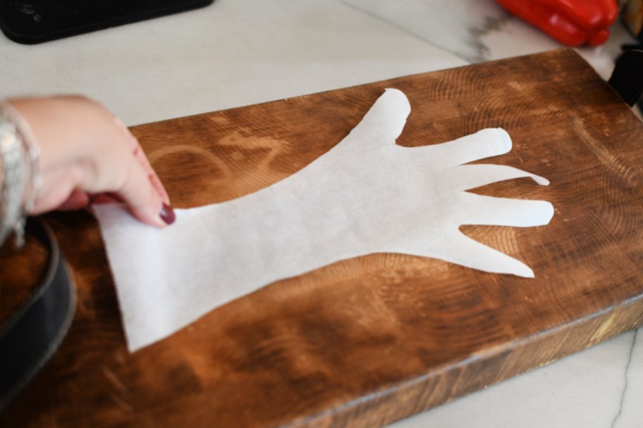 adding arm and hand outline to wood board