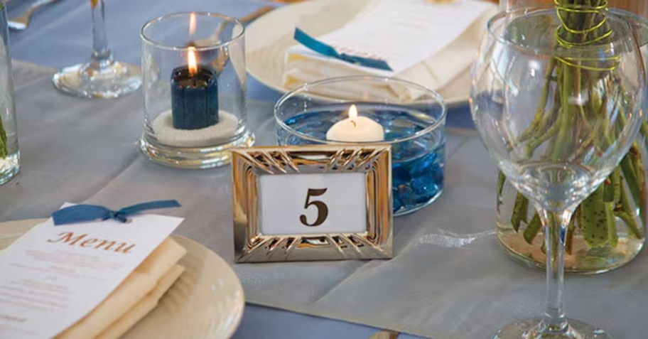 close up of framed table number on wedding table