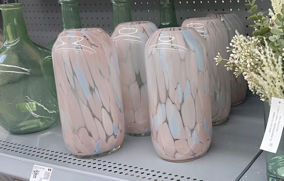 multicolored glass vases on store shelf