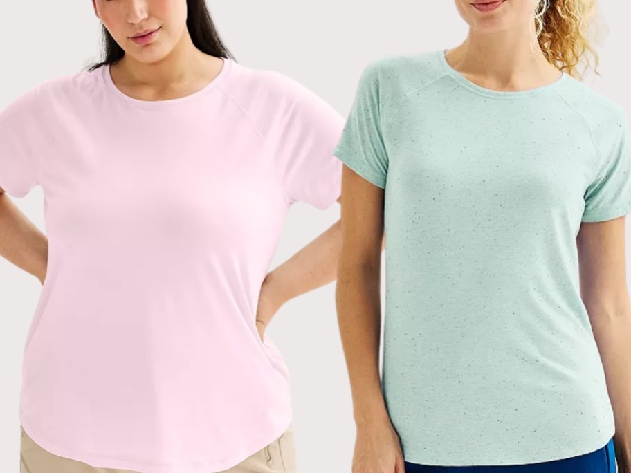 woman wearing a pink tee and woman wearing a green tee