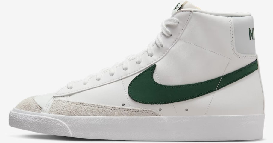a white with green accents Nike Blazer mid style shoe