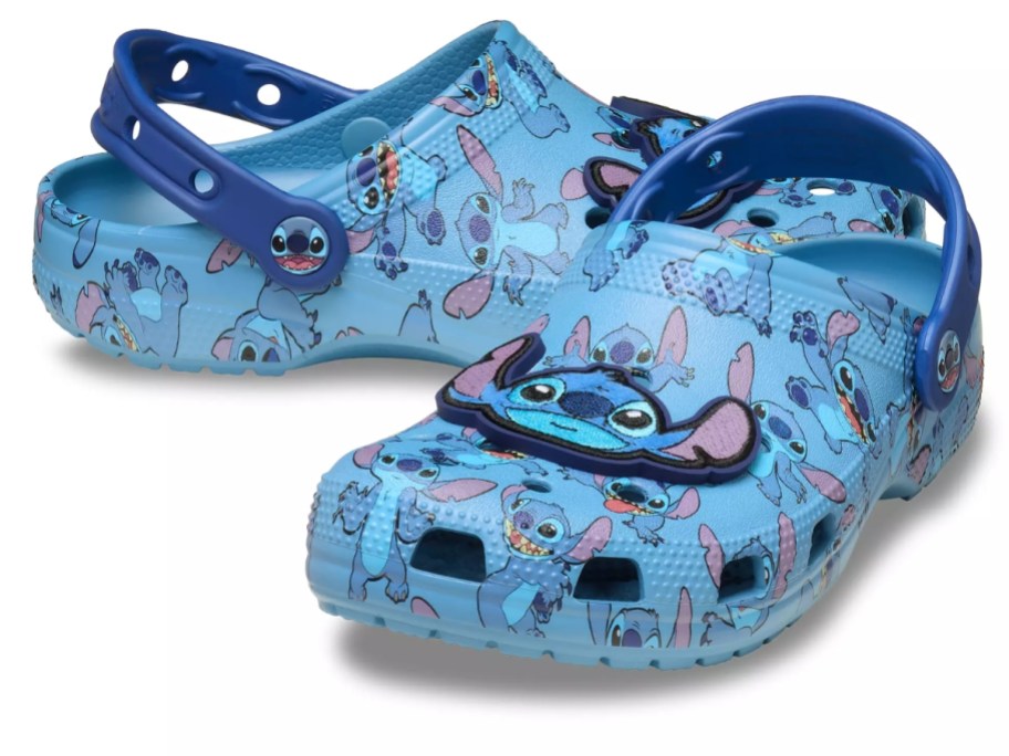 a pair of Stitch Crocs clogs