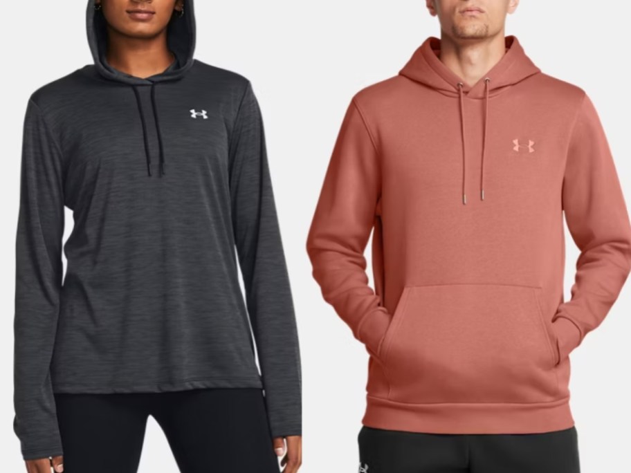 woman and man wearing different color Under Armour hoodies