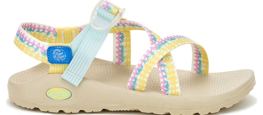 a women's Chaco sandal with colorful straps and an off white sole