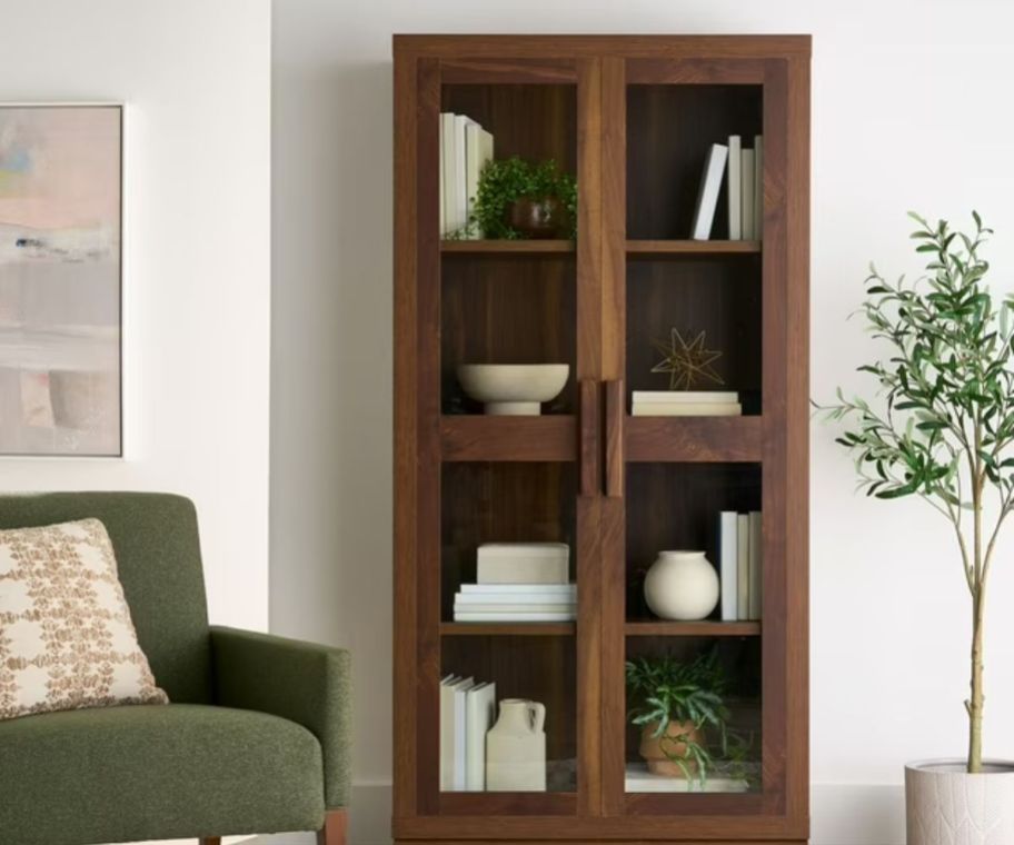 A wooden cabinet in a living room