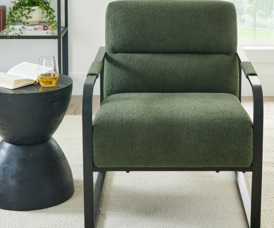 A green chair in a living room