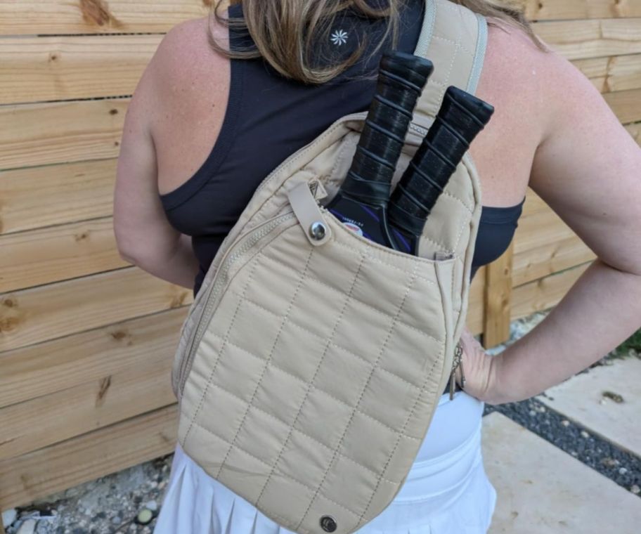 A woman with a pickleball bag