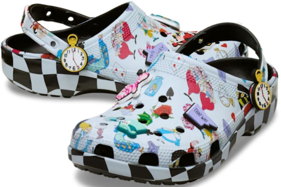 a pair of alice in wonderland themed crocs with jibits