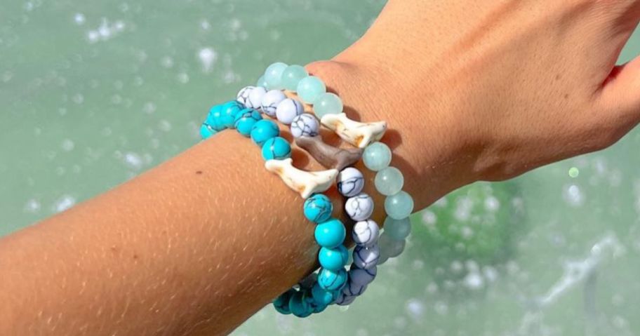 a Wrisr wearing Fahlo Animal Tracking Bracelets