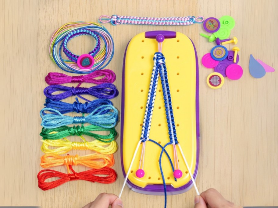 a friendship bracelet making kit with a loom and case