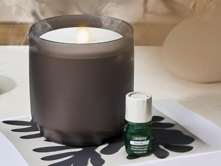 a flameless candle essential oil diffusers on a desk