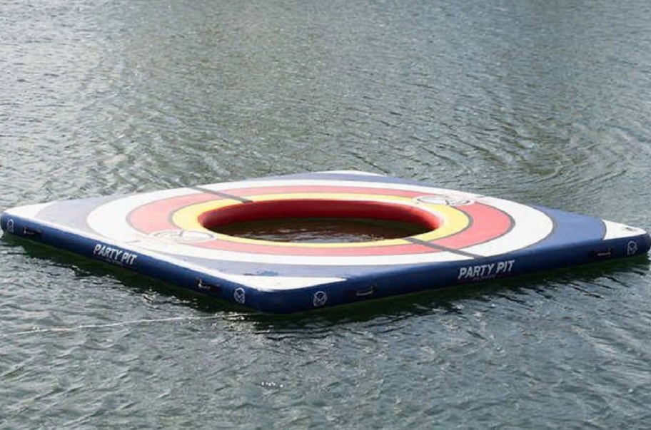 inflatable water mat in the middle of a lake floating around
