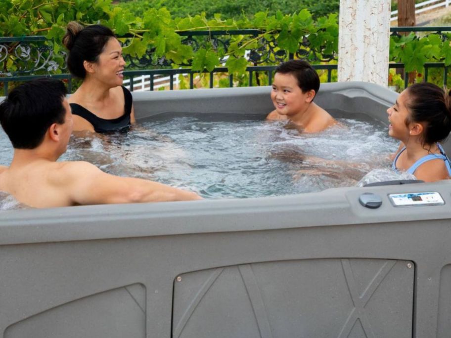 Two Adults and Two Kids in a Lifesmart 5-Person Spa