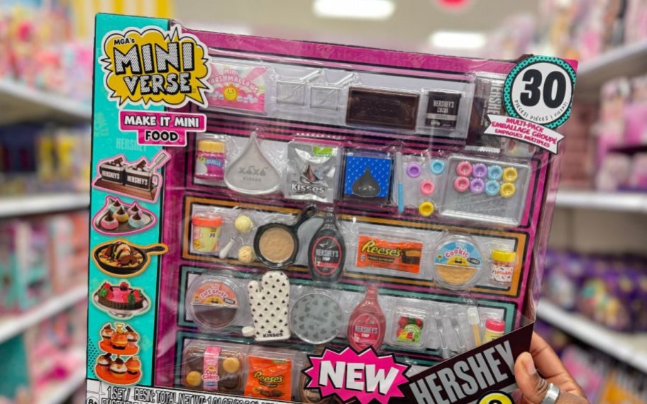 hand holding MGA's Miniverse Make It Mini Hershey's Multipack box in store