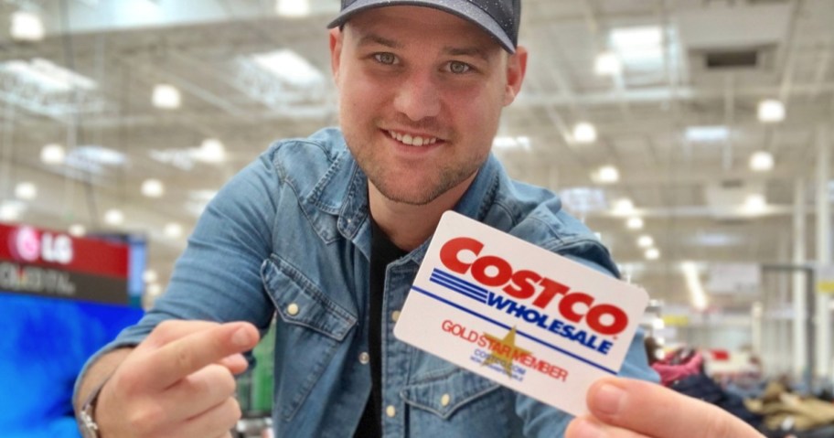 Man holding Costco membership card