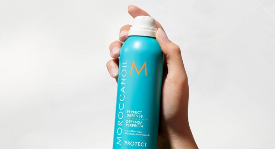 Moroccanoil Heat Protectant spray in hand