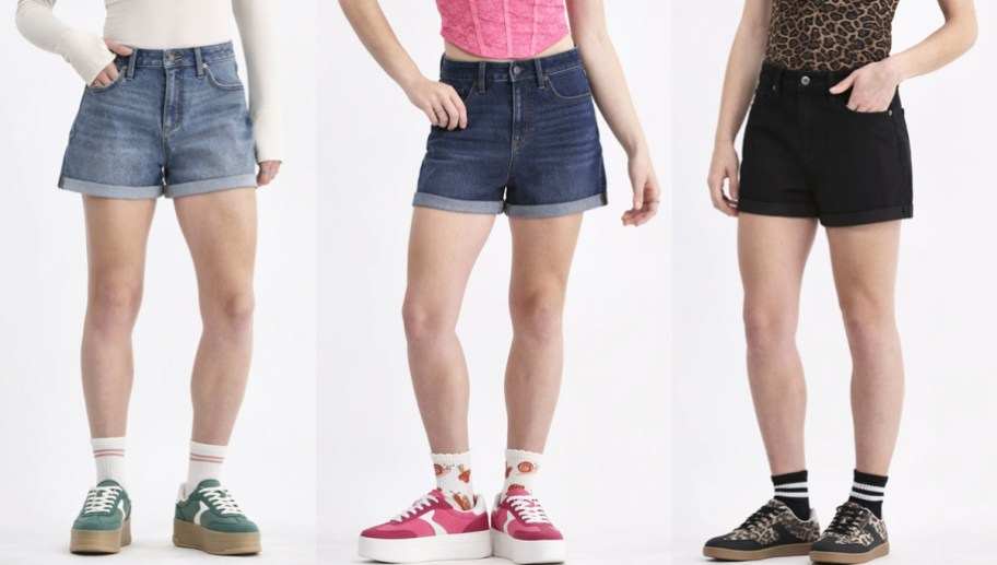 three women modeling shorts in different washes
