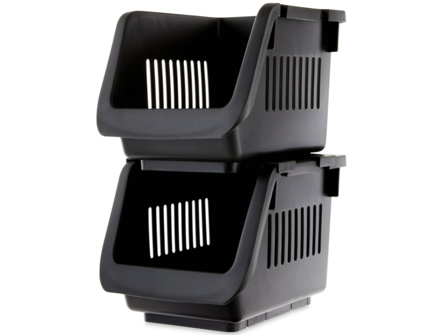 two stacked black storage bins