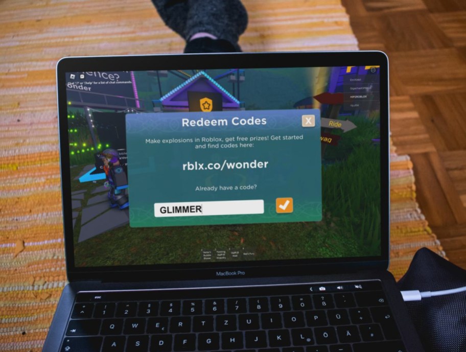 Person redeeming Roblox Codes in 2024