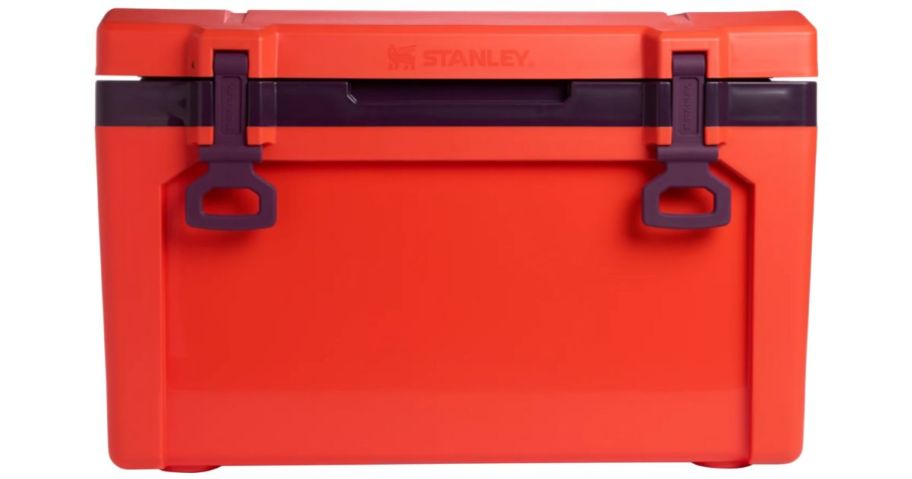 An orange Stanley cooler