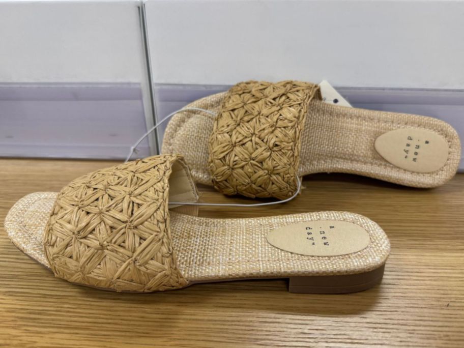 A pair of A New Day Women's Ariella Woven Raffia Slide Sandals