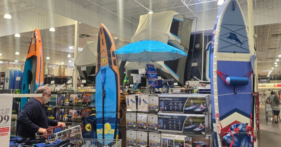 The sport section of Costco featuring large paddle boards