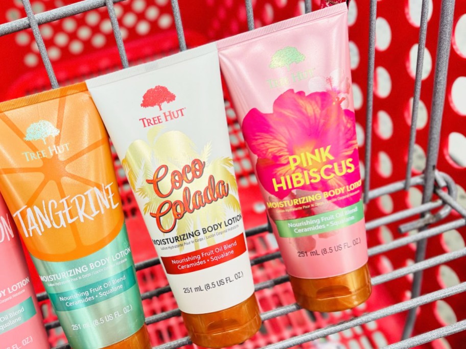 bottles of Tree Hut Body Lotions in red shopping cart