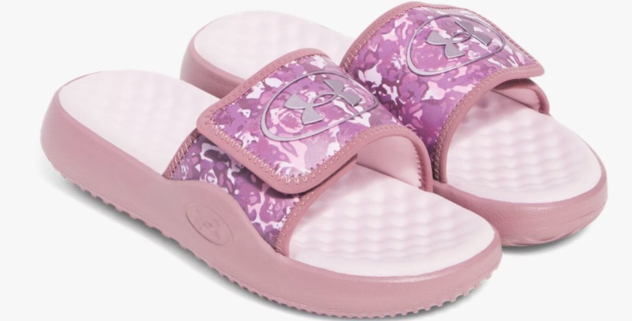 pair of pink platform slides with pink straps