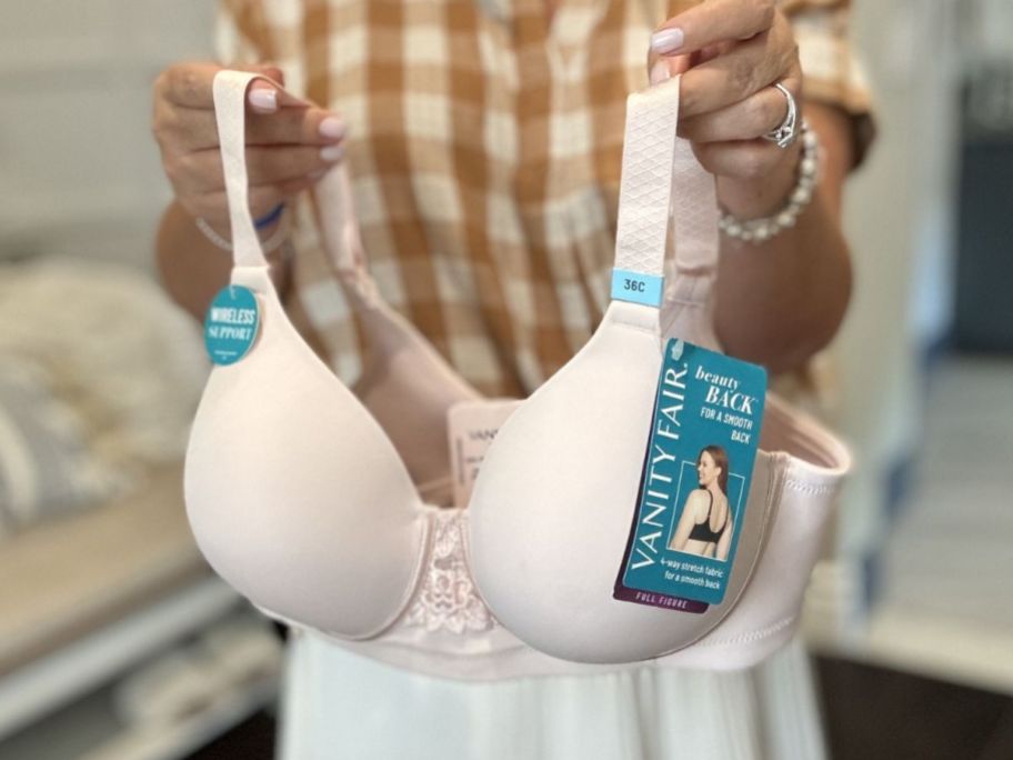 woman holding a Vanity Fair Beauty Back Full Figure Wireless Smoothing Bra