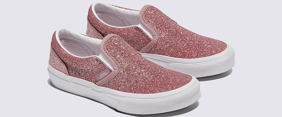 pair of pink glittery slip on shoes