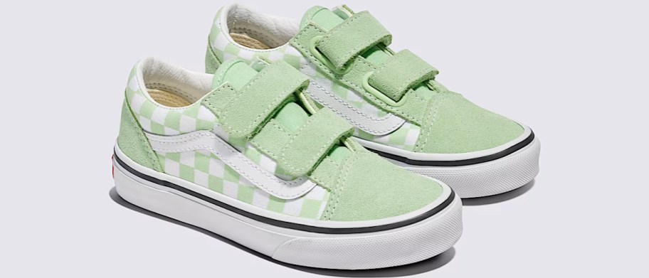 pair of green and white checkerboard velcro sneakers