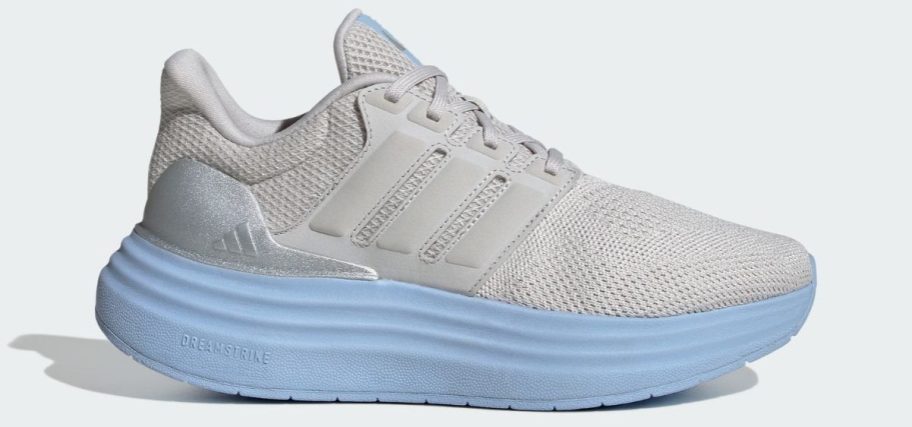 white and blue adidas Women's Ultradream Bold Shoe stock image