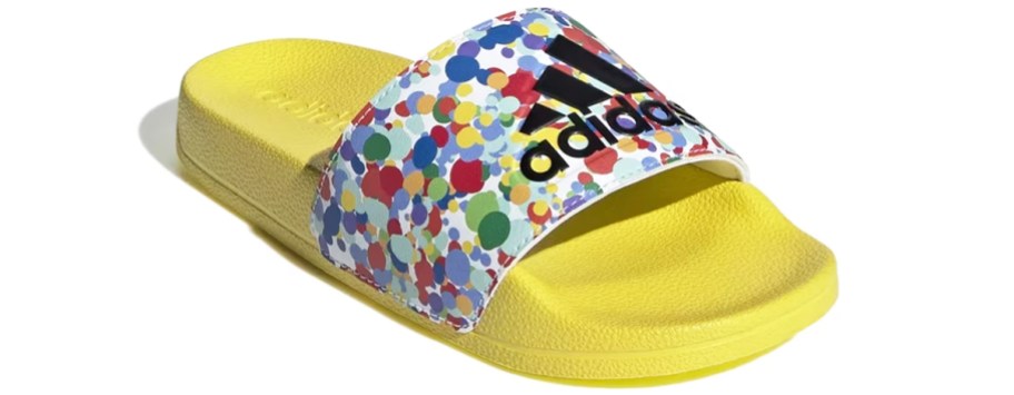 yellow slide sandal with a multi-color dot print strap