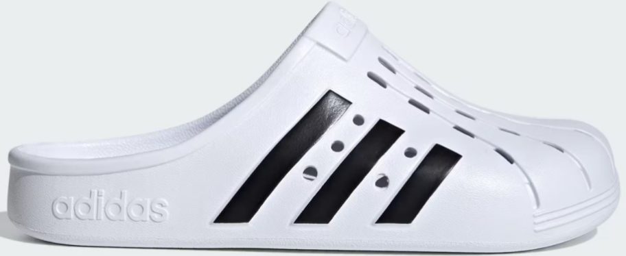 a white eva clog shoe with black stripes