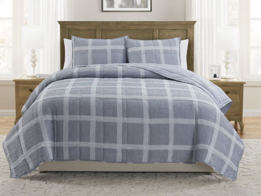 blue My Texas House Waldin 3-Piece Windowpane Plaid Box Quilt Set on bed in bedroom