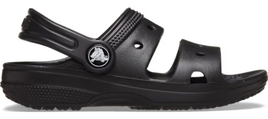 black Crocs Toddler Classic Crocs Sandal stock image