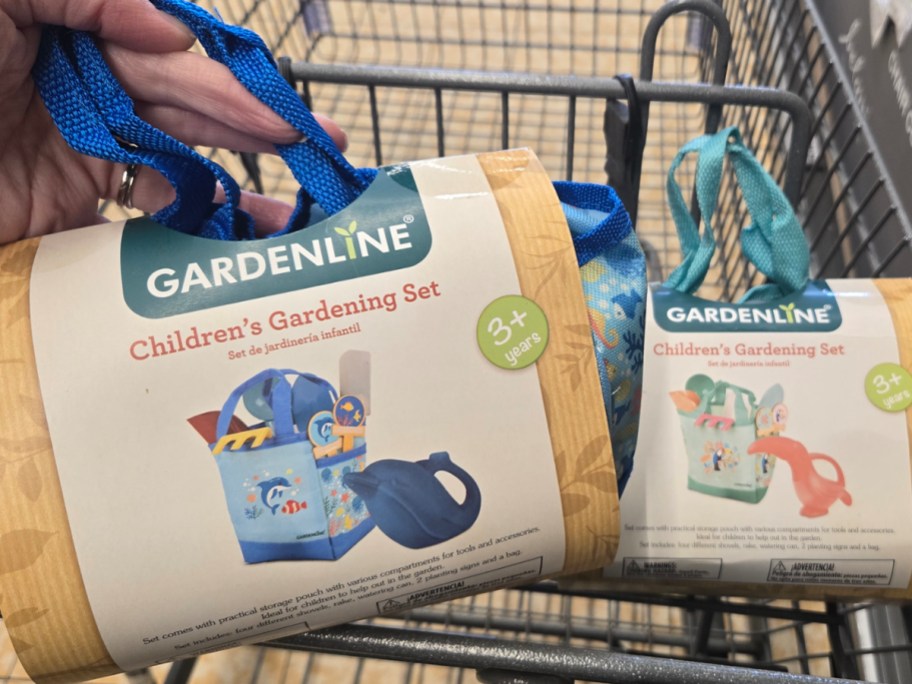 two kids gardening kits in shopping cart 