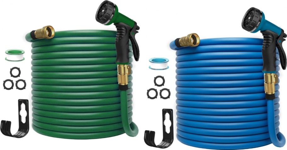 water hoses coiled up with sprayers and accessories next to them