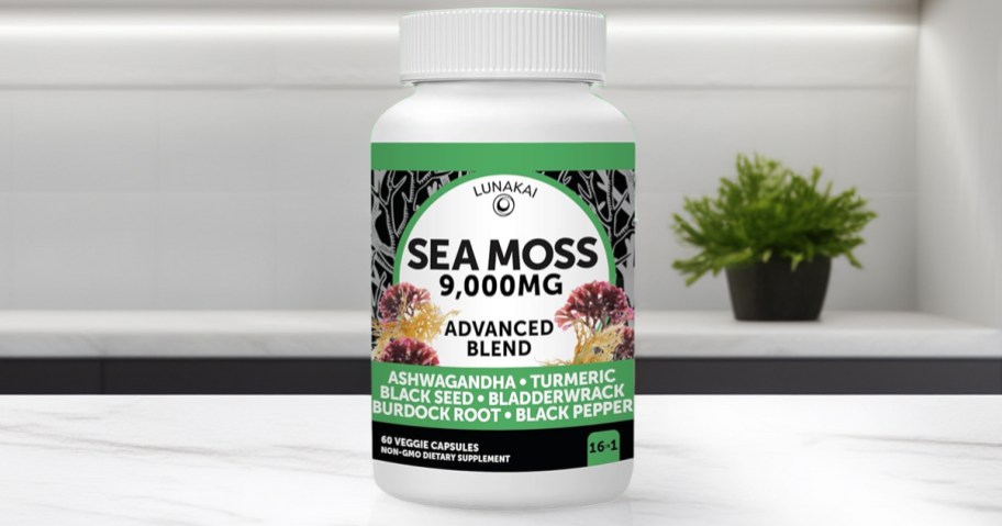 bottle of sea moss on a white kitchen counter