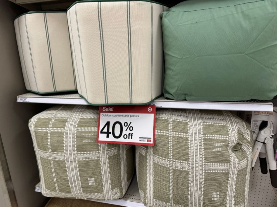 a selection of outdoor poufs on a store shelf