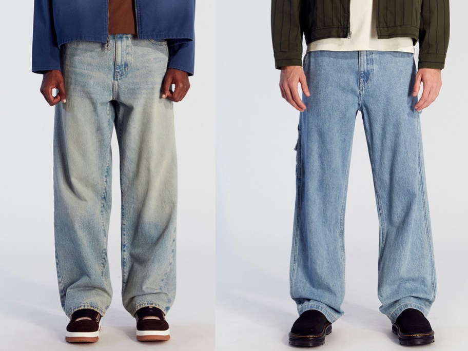 two men wearing blue jeans