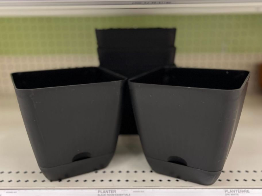 black Room Essentials 10" Square Self-Watering Indoor/Outdoor Planters on shelf in store