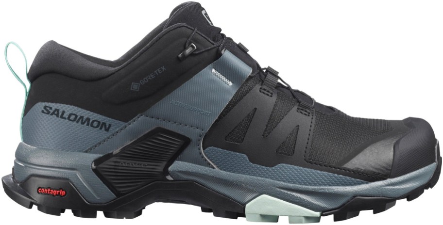 black and gray saloman shoe