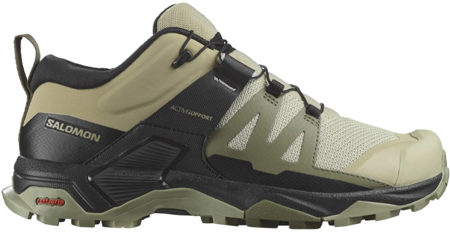 green and black saloman shoe