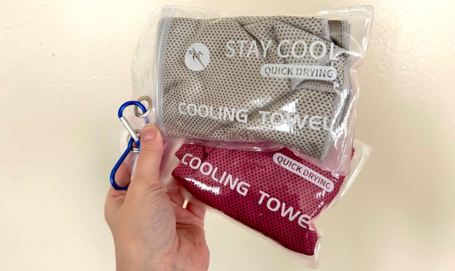 hand holding stay cool cooling towels in clear bag