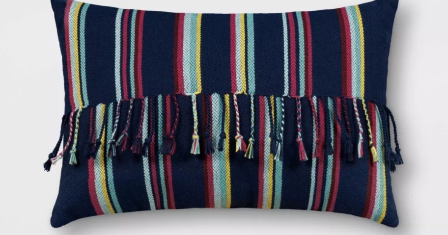 a striped fringe throw pillow